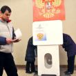 Выборы президента РФ на избирательном участке № 2079 в здании Российской Академии наук в Москве
