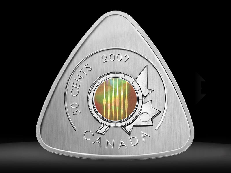 Королевский монетный двор Канады выпускает коллекционную монету в форме гитарного медиатора.