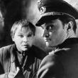 Альгимантас Масюлис (справа) в роли офицера СС в фильме «Чужое имя». 1966