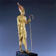Статуя Тутанхамона, идущего с посохом 