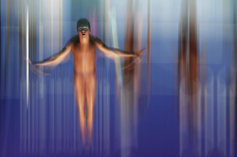 Адам Притти (Австралия). Томас Дэйли (Великобритания) выступает в отборочных соревнованиях по прыжкам с трехметрового трамплина среди юношей на Первых Юношеских Олимпийских играх. Сингапур, август 2010 года 1-е место — «Спорт» (серии)