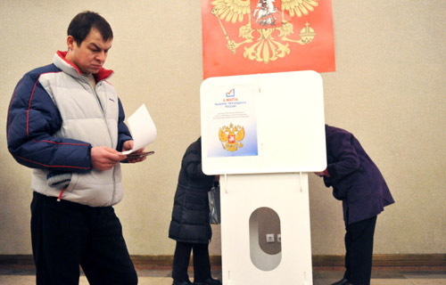 Выборы президента РФ на избирательном участке № 2079 в здании Российской Академии наук в Москве